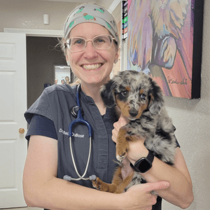 Dr. DuBose holding a puppy